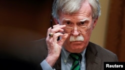 National Security Adviser John Bolton at a meeting between U.S. President Donald Trump and NATO Secretary General Jens Stoltenberg in the Oval Office at the White House in Washington, April 2, 2019.