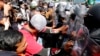 Estallan protestas cerca de cumbre de APEC en Bangkok
