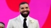 FILE - Drake appears at the Billboard Music Awards in Los Angeles on May 23, 2021. He is among the artists whose music Universal Music Group said it would no longer allow on the platform in a licensing dispute. 