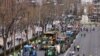Farmers drive their tractors during a protest organised by 'Union de Uniones' union, in central Madrid, on March 17, 2024. 