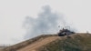 Sebuah tank Israel bermanuver di dekat perbatasan Israel-Gaza, di tengah konflik Israel dan kelompok Islam Palestina Hamas, di Israel, 14 Maret 2024. (REUTERS/Carlos Garcia Rawlins)