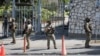 Canadian soldiers stand guard by the Canadian embassy as violence spreads and armed gangs expand their control over Port-au-Prince, Haiti, March 29, 2024.