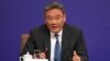 FILE - Chinese Commerce Minister Wang Wentao speaks at a press conference in Beijing, March 6, 2024.