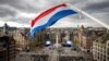 People gather as the Netherlands holds its annual World War II remembrance ceremony in Amsterdam, Netherlands, May 4, 2024. (Remko De Waal/Pool via Reuters)