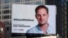 Sebuah papan iklan yang mendesak pembebasan wartawan koran the Wall Street Journal, Evan Gershkovich, untuk memperingati 1 tahun penahanannya di Rusia,, dipasang di Times Square, New York, 29 Maret 2024. (Foto: Yuki Iwamura/AP Photo)