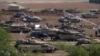 Tropas israelíes se concentran en la frontera, mientras Israel ordena la evacuación del norte de Gaza