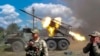 ARCHIVO: Soldados rusos disparan un lanzador de cohetes BM-21 Grad desde una posición no revelada en esta foto divulgada por el Ministerio de Defensa de Rusia el 1 de julio de 2024.