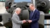 Britain's King Charles III officially hands over the role of Colonel-in-Chief of the Army Air Corps to Prince William, in front of a helicopter at the Army Aviation Centre in Middle Wallop, Britain, May 13, 2024.