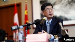 FILE - China's ambassador to Canada, Cong Peiwu, speaks at the Chinese Embassy in Ottawa, Canada, Nov. 22, 2019. 