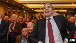 Simon Harris laughs during the Fine Gael convention at the Sheraton Hotel in Athlone, Ireland, March 24, 2024, before being declared leader and de facto prime minister-in-waiting.