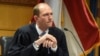 Fulton County (Ga.) Judge Scott McAfee addresses lawyers in the election interference case against former President Donald Trump, March 28, 2024, in Atlanta. Trump on March 29 sought a reversal of McAfee's ruling that let the Fulton district attorney stay on the case.