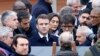 President of the Paris Organizing Committee of the 2024 Olympic and Paralympic Games Tony Estanguet, President Macron, Minister for Sports and Olympics Amelie Oudea-Castera and other officials attend the inauguration of the Olympic village in Saint-Denis, Feb. 29, 2024. 