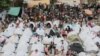 FILE — People fleeing gang violence take shelter at a sports arena in Port-au-Prince, Haiti, Sept. 1, 2023. 