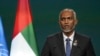 FILE - Maldives President Mohamed Muizzu speaks at the COP28 UN Climate Summit, Dec. 1, 2023, in Dubai, United Arab Emirates. 