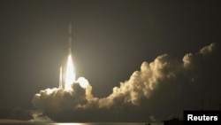 An H-2A rocket carrying four satellites including one from South Korea blasts off from the launching pad at Tanegashima Space Center on the Japanese southwestern island of Tanegashima, May 18, 2012