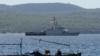 Kapal TNI AL KRI Singa dalam operasi pencarian kapal selam KRI Nanggala yang hilang, menelusuri perairan di lepas pantai Banyuwangi, Jawa Timur, Kamis, 22 April 2021. (AP Photo)