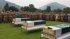 Army soldiers and civilians attend the funeral of three soldiers who, according to Pakistan Army, were killed in a cross-border exchange of fire on the Line of Control, at army stadium in Muzaffarabad, Pakistan-administrated Kashmir, Aug. 16, 2019. 
