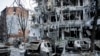 Damaged vehicles and buildings in Kharkiv city center in Ukraine, March 16, 2022. 