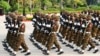 Members of the military march during a parade to commemorate Myanmar's 77th Armed Forces Day in Naypyitaw, Myanmar, March 27, 2022. 