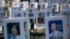 Candidates' posters for the upcoming general elections are hung on strings over the Cheonggye stream in downtown Seoul, South Korea, Monday, April 11, 2016.