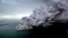 This aerial picture taken on Dec. 23, 2018 by Bisnis Indonesia shows the Anak (Child) Krakatoa volcano erupting in the Sunda Straits off the coast of southern Sumatra and the western tip of Java. 