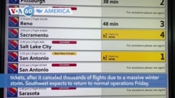 VOA60 America - Southwest expects to return to normal operations Friday