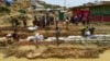 Rohingya refugees make a drainage canal in preparation for the upcoming monsoon season in Kutupalong refugee camp in Ukhia, Bangladesh, May 8, 2018.