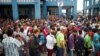 Venezuelan migrants wait to cross border at the Binational Border Service Center of Peru, on the border with Ecuador, in Tumbes, Peru, Oct. 31, 2018. 