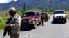This handout picture released by the Royal Papua New Guinea Constabulary on Feb. 19, 2024, shows officials patrolling near the town of Wabag, 600 kilometres northwest of the capital Port Moresby.