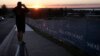 FILE - Land being developed for the new home construction is pictured at sunset in southern Sydney, Australia.