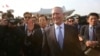 U.S. Defense Secretary Jim Mattis, center right, walks with South Korean Defense Minister Han Min Koo, center left, to meet Korean War veterans at the National Cemetery in Seoul, South Korea, Feb. 3, 2017.