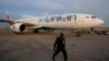 FILE - A SriLankan Airlines plane arrives in Colombo, Sri Lanka, Dec. 6, 2021. Sri Lanka's national airline on Feb. 27, 2024, blamed a rat for grounding a plane for three days, causing delays.