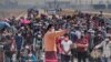မတ်လ ၃၁ရက်နေ့ ပြန်လာတဲ့မြန်မာရွှေေြ့ပာင်းအလုပ်သမားများ (ပုံ-ကရင်ပြည်နယ် လွှတ်တော်ကိုယ်စားလှယ် ဦးသန့်ဇင်အောင်)