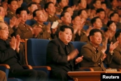 FILE - North Korean leader Kim Jong Un (C) applauds during a concert marking the 70th founding anniversary of the Korean People's Army (KPA) military band in this undated photo released by North Korea's Korean Central News Agency (KCNA) in Pyongyang, Feb. 23, 2016.