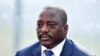 This file photo taken on February 3, 2015 shows the Democratic Republic of the Congo's President Joseph Kabila attending a training session of his country's football team in Bata.