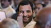 Congress party leader Rahul Gandhi greets a person attends the swearing-in ceremony for the new ministers in New Delhi, India, October 28, 2012. 