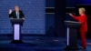 Republican presidential nominee Donald Trump and Democratic presidential nominee Hillary Clinton speak during their first presidential debate at Hofstra University in Hempstead, N.Y., Sept. 26, 2016. 