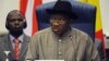 Nigerian President Goodluck Jonathan reads his opening address during an ECOWAS Summit gathering west African leaders to plot a military strategy to wrest control of northern Mali from Islamist groups as fears grow over the risks they pose to the region a