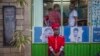 A security guard sits near a gate in Addis Ababa, Ethiopia, Oct. 10, 2016.