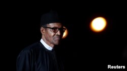 Nigeria's President Muhammadu Buhari arrives at the Orsay Museum, in Paris, Nov. 10, 2018.