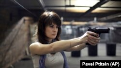 RUSSIA -- Maria Butina, who pleaded guilty on December 13, 2018, to conspiracy to act illegally as an unregistered Russian agent, photographed at a shooting range in Moscow, April 22, 2012.