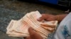 Cómo Venezuela ha logrado inesperadamente desacelerar la inflación a tasas mensuales de un dígito