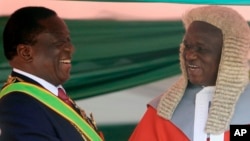 UMongameli Emmerson Mnangagwa loMnu. Luke Malaba.