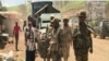 FILE - Cameroon troops watch for separatists in Cameroon's northwest region, Bamenda, Cameroon, May 24, 2019. Cameroonians who fled the fighting are allegedly being deported from the U.S. and sent back to Cameroon on Oct. 14, 2020.