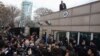 U.S. Ambassador to Turkey Francis Ricciardone (L, with white hair) speaks to media outside of the U.S. Embassy in Ankara, February 1, 2013.