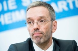 FILE - Austrian Minister of the Interior Herbert Kickl, of the right-wing Freedom Party, addresses the media during a news conference in Vienna, Austria, May 20, 2019.