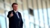 La forma como el presidente de Brasil, Jair Bolsonaro ha minimizado el efecto del coronavirus, le ha generado duras críticas en la oposición.