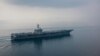 The aircraft carrier USS Carl Vinson (CVN 70) transits the Sunda Strait. The Carl Vinson Carrier Strike Group is on a regularly scheduled Western Pacific deployment.
