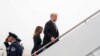 FILE - U.S. President Donald Trump and first lady Melania Trump board Air Force One as they depart Washington en route to Pennsylvania from Joint Base Andrews in Maryland, Sept. 11, 2018.