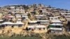 FILE - A deforested section of the Chakmakul camp for Rohingya refugees clings to a hillside in southern Bangladesh, Feb. 13, 2018. 